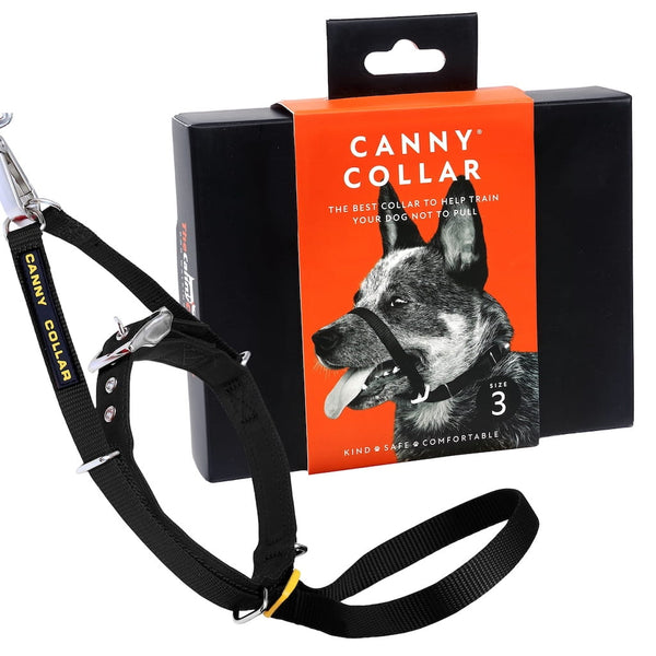 Black Canny Collar head collar in retail packaging with the wording 'The best collar to stop pulling' next to a dog wearing the collar.